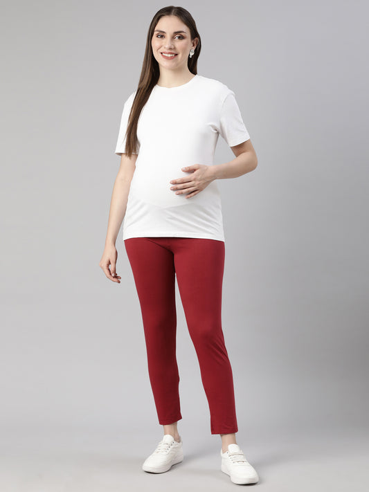 Maroon maternity comfy pants with ankle-length tapered legs and adjustable waist