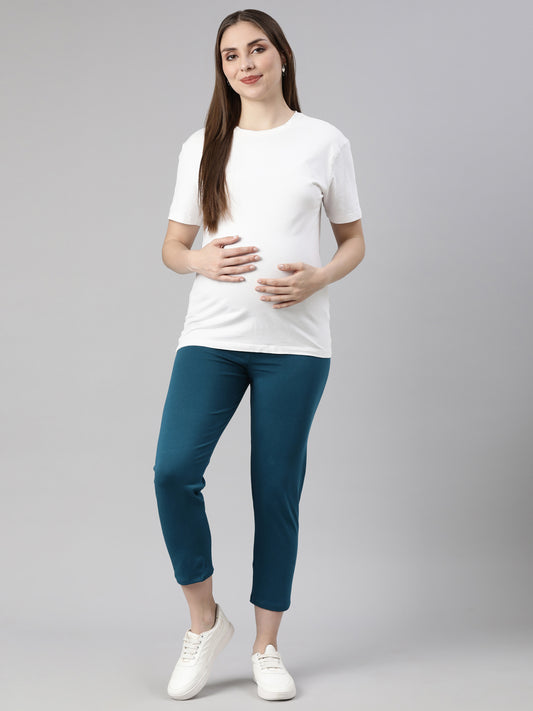 Maternity capri pants in deep blue with side pockets and under-belly panel