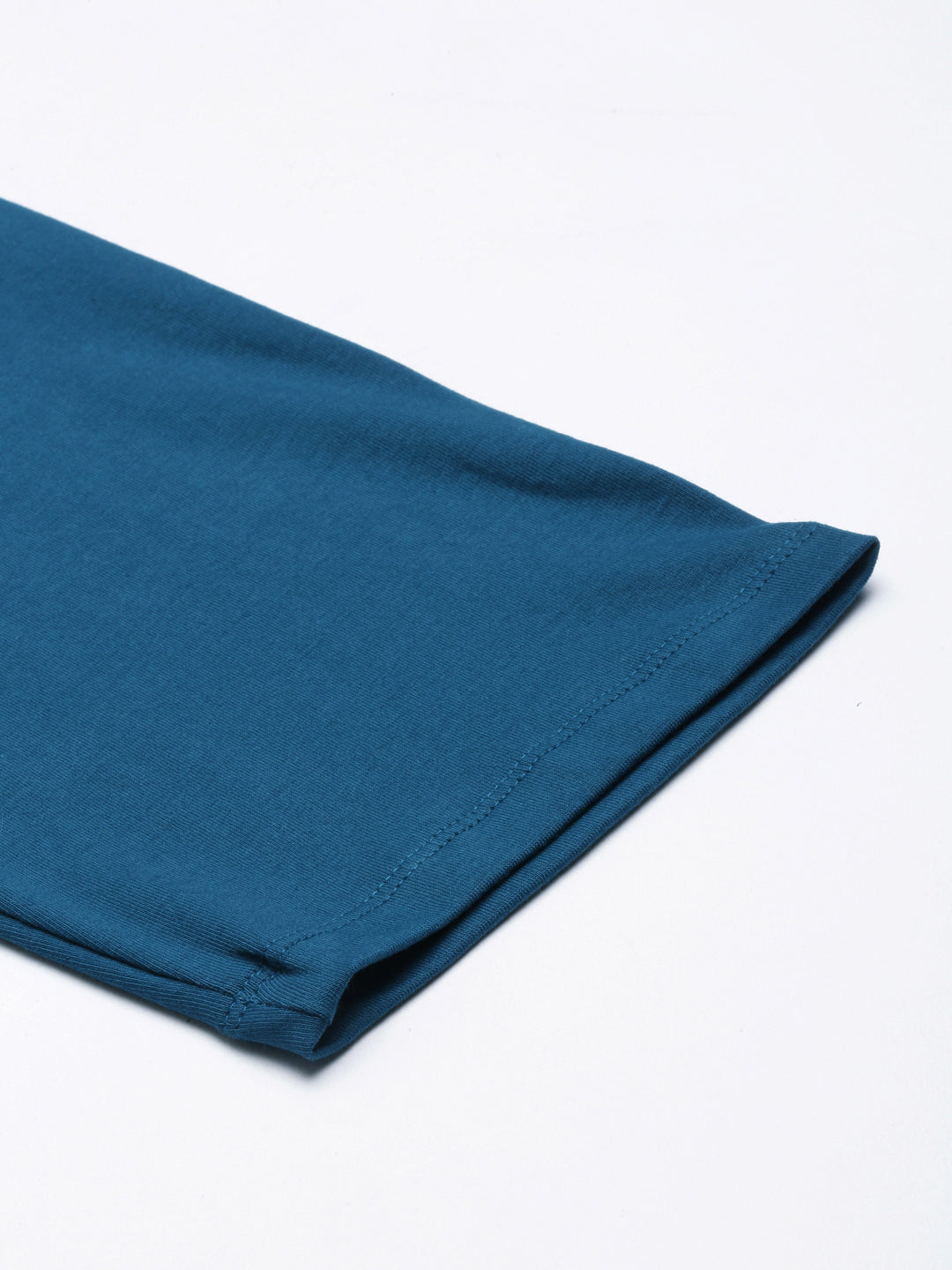 Deep blue maternity pants ankle hem with stitched edge and tapered leg opening