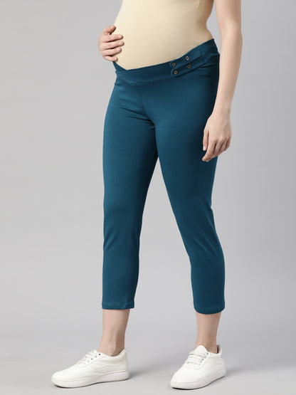 Maternity capri pants in deep blue with button-adjustable waistband and belly panel