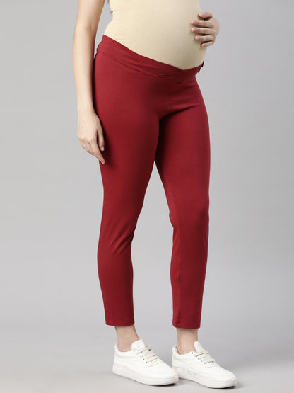 Maroon maternity leggings with over-belly stretch waistband