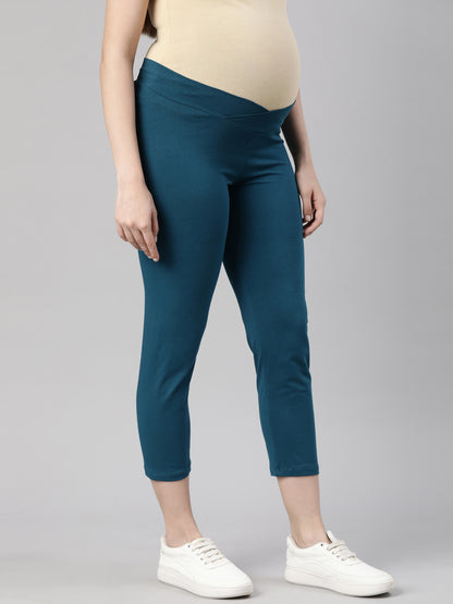 Maternity capri pants in deep blue with straight slim legs and ankle-length hem