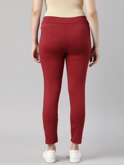 Maroon maternity comfy pants with smooth front and ankle-length tapered leg