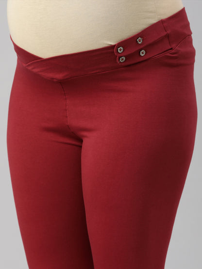 Maroon adjustable maternity waistband with snap button placket detail